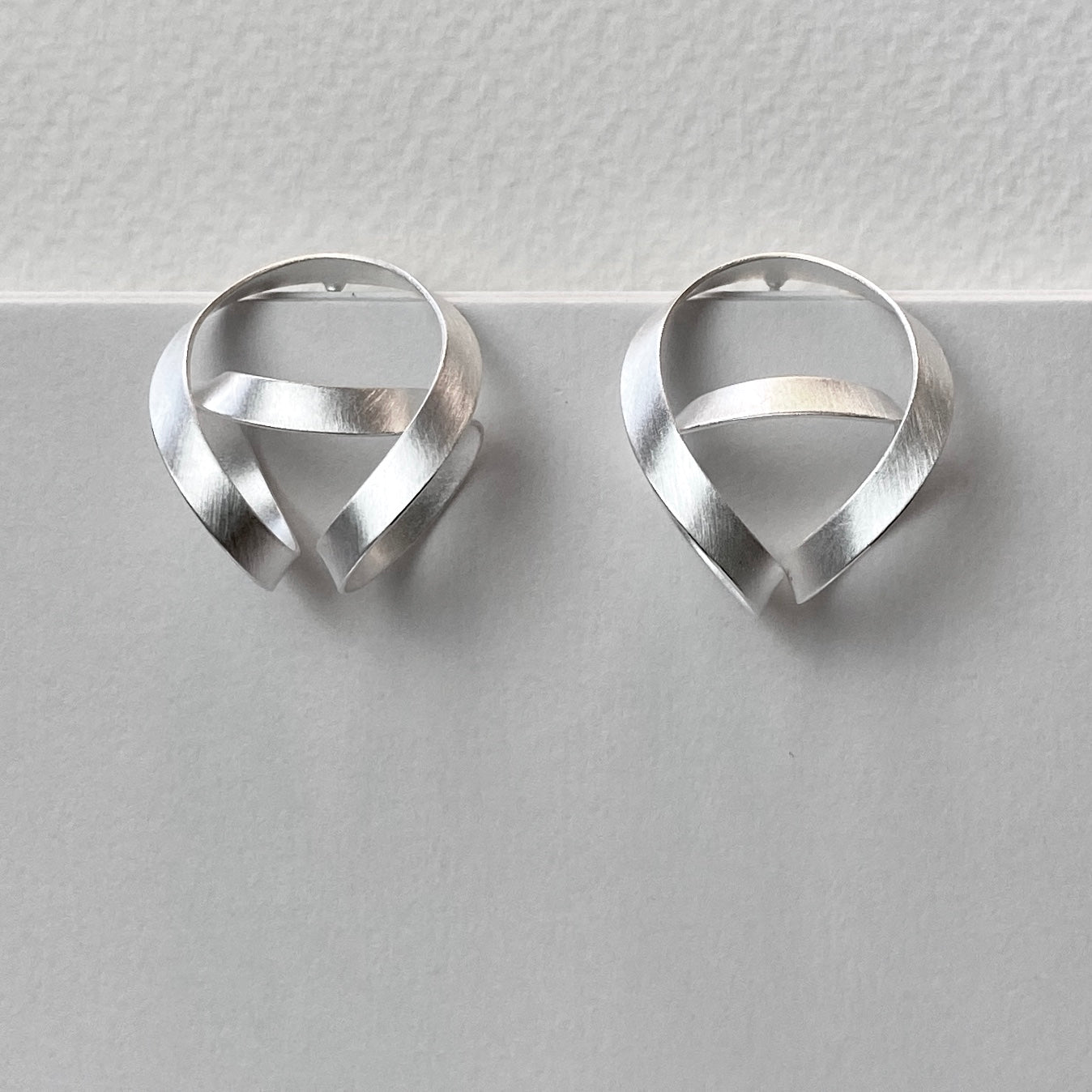 Beautifully Wound Satin Silver Earrings | Contemporary Designer Jewellery